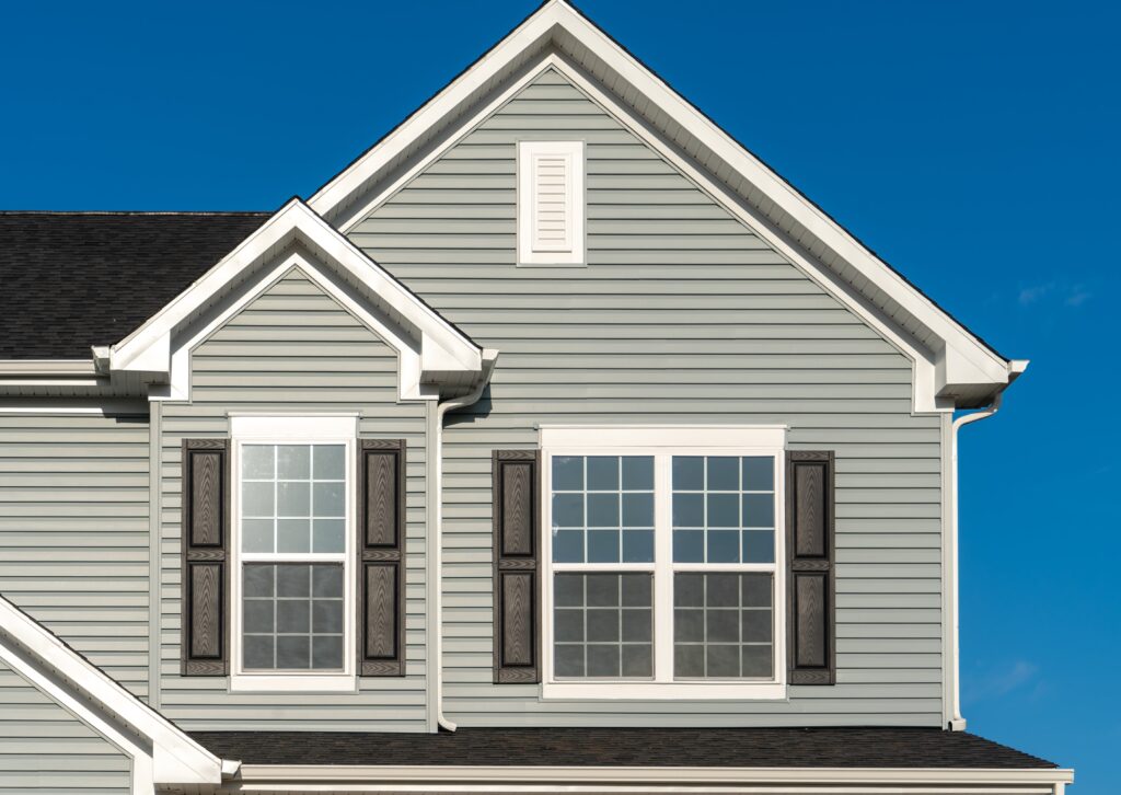 Close-up of home with vinyl siding